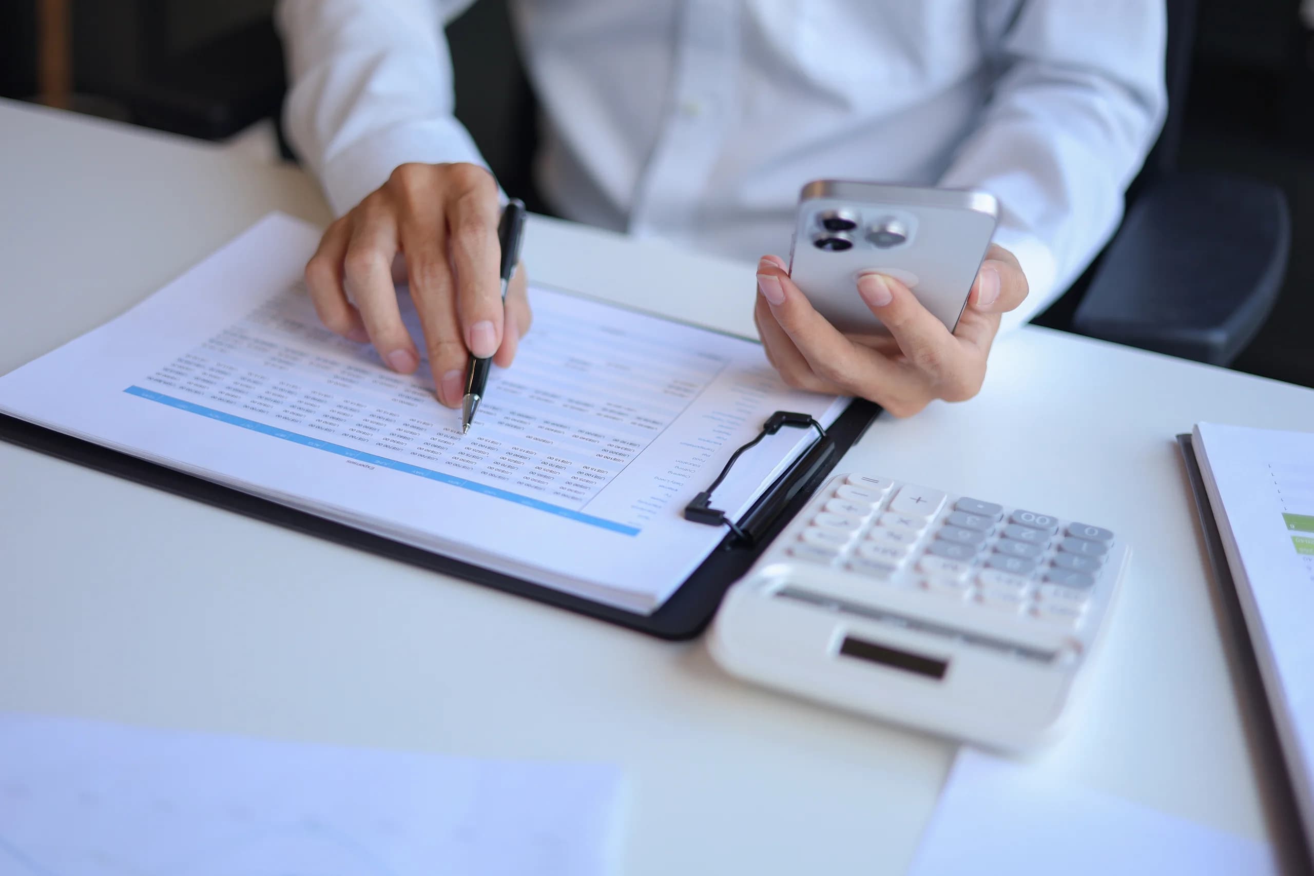 Financial documents and calculator for audit and assurance services